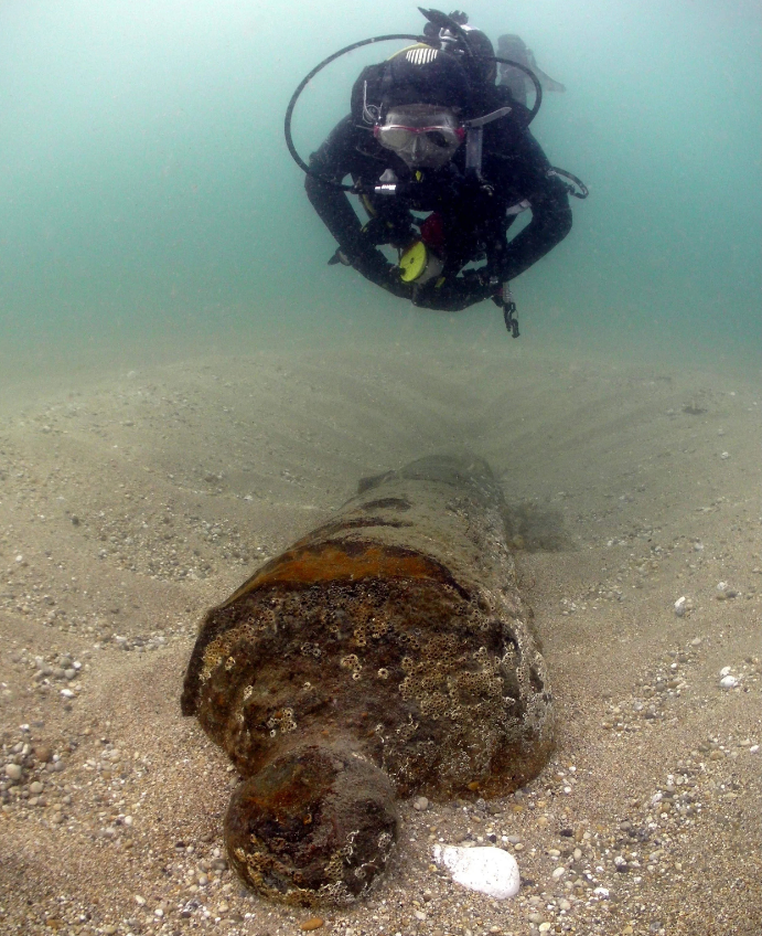 Diver hovering near reef